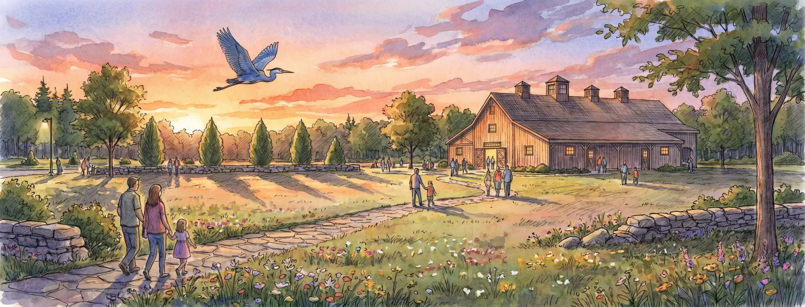 Traditional timber barn at dusk with warm amber sky