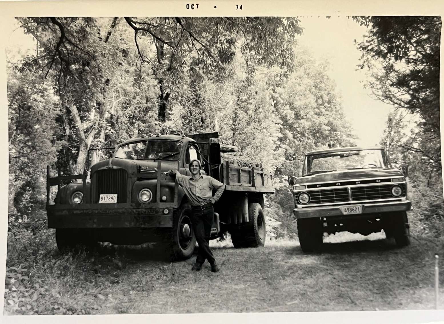 Logging trucks in the New England woods